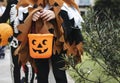 Young kids trick or treating during Halloween Royalty Free Stock Photo