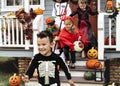 Young kids trick or treating during Halloween Royalty Free Stock Photo