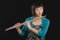 Young Korean Woman Holding Flute Royalty Free Stock Photo
