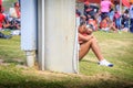 Young Lady Attends Baby Between Track Heats