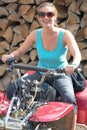 Young lady on ATV Royalty Free Stock Photo