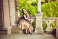 Young lady on the balcony with venetian masks Royalty Free Stock Photo