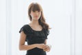 Young lady in black dress Royalty Free Stock Photo