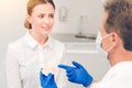 Young lady with braces attending stomatologist