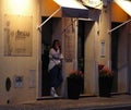 Young Lady In Doorway In Faro Portugal
