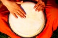 Young lady drummer with her djembe drum. Royalty Free Stock Photo