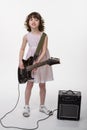 Young lady with electric guitar