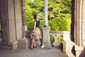 Young lady in evening dress on the balcony of the castle Royalty Free Stock Photo