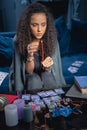 Young lady getting ready for card reading Royalty Free Stock Photo