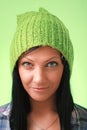 Young lady in green woollen cap