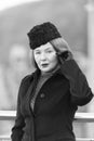 Lady in black hat. Portrait of lade in coat. Air-hostess welcome you. Spring fashion for female. Styled woman black and white phot