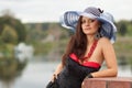 Young lady in hat with an umbrella Royalty Free Stock Photo