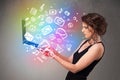 Young lady holding notebook with colorful hand drawn multimedia Royalty Free Stock Photo