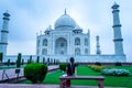 Young lady looking at Taj Mahal