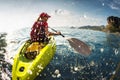 Young lady paddling the kayak Royalty Free Stock Photo