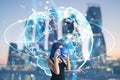 Young lady with photo camera and abstract globe sphere with coding and polygonal network on blurry city background. Future, Royalty Free Stock Photo