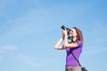 Young lady photographer outdoors Royalty Free Stock Photo