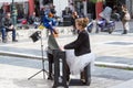 Young lady playing electric piano at Aristotelous square