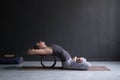 Woman practicing yoga in lotus fish posture Matsyasana Royalty Free Stock Photo