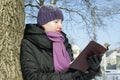 Young lady reading book Royalty Free Stock Photo