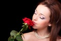 Young lady with red rose Royalty Free Stock Photo