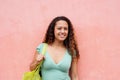 Young lady smiling with bag Royalty Free Stock Photo