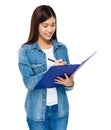 Young lady write on the paper board Royalty Free Stock Photo