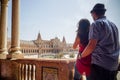 Young latin couple looking at Plaza de EspaÃÂ±a Sevilla in Spain