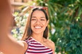 Young latin girl smiling happy making selfie by the camera at the city Royalty Free Stock Photo