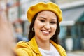 Young latin girl smiling happy making selfie by the camera at the city Royalty Free Stock Photo