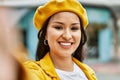 Young latin girl smiling happy making selfie by the camera at the city Royalty Free Stock Photo