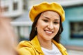 Young latin girl smiling happy making selfie by the camera at the city Royalty Free Stock Photo