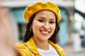 Young latin girl smiling happy making selfie by the camera at the city Royalty Free Stock Photo