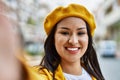 Young latin girl smiling happy making selfie by the camera at the city Royalty Free Stock Photo