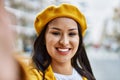 Young latin girl smiling happy making selfie by the camera at the city Royalty Free Stock Photo