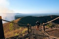 Young latin man appreciating the wonderful view on a stairway trail in masaya volcano national park, Nicaragua