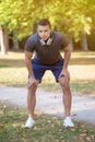 Young latin man runner running sports training fitness ready start portrait format Royalty Free Stock Photo