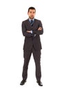 Young latin man standing wearing grey suit