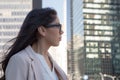 Young latin professional woman with glasses in the city Royalty Free Stock Photo