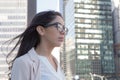 Young latin professional woman with glasses in the city Royalty Free Stock Photo