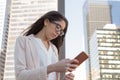 Young latin professional woman with glasses in the city Royalty Free Stock Photo