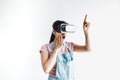 Young latin woman with glasses of virtual reality on a white background. Future technology concept. Modern imaging technology in L Royalty Free Stock Photo