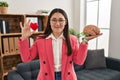 Young latin woman working as couple therapist smiling with a happy and cool smile on face