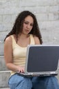 Young Latina Student with Computer