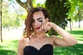 Young latina and transsexual woman dressed in fine black lingerie. The woman is posing for the camera with her mascara smudged Royalty Free Stock Photo