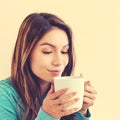 Young latina woman drinking coffee Royalty Free Stock Photo