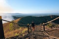 Young latino man climbing stairway trail in Masaya volcano national park, Nicaragua