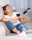 Latino woman relaxing at evening with glass of red wine Royalty Free Stock Photo