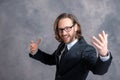 Young laughing businessman in black suit Royalty Free Stock Photo