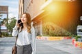 Young lawyer business woman walking street outdoor calling and talking on mobile Royalty Free Stock Photo